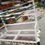 Carro logístico con rodillos plastificados para transporte de piezas en línea de producción